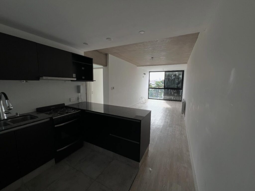 EN VENTA. DEPARTAMENTO DE DOS DORMITORIOS EN PICHINCHA, ROSARIO.